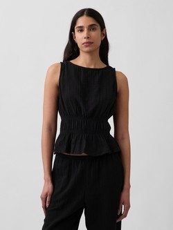 Ženska bluza brez rokavov z zmečkanim videzom in peplum naborkom